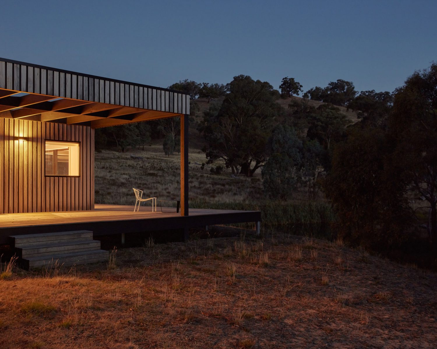 archiblox bonnie doon house at dusk with lonely chair